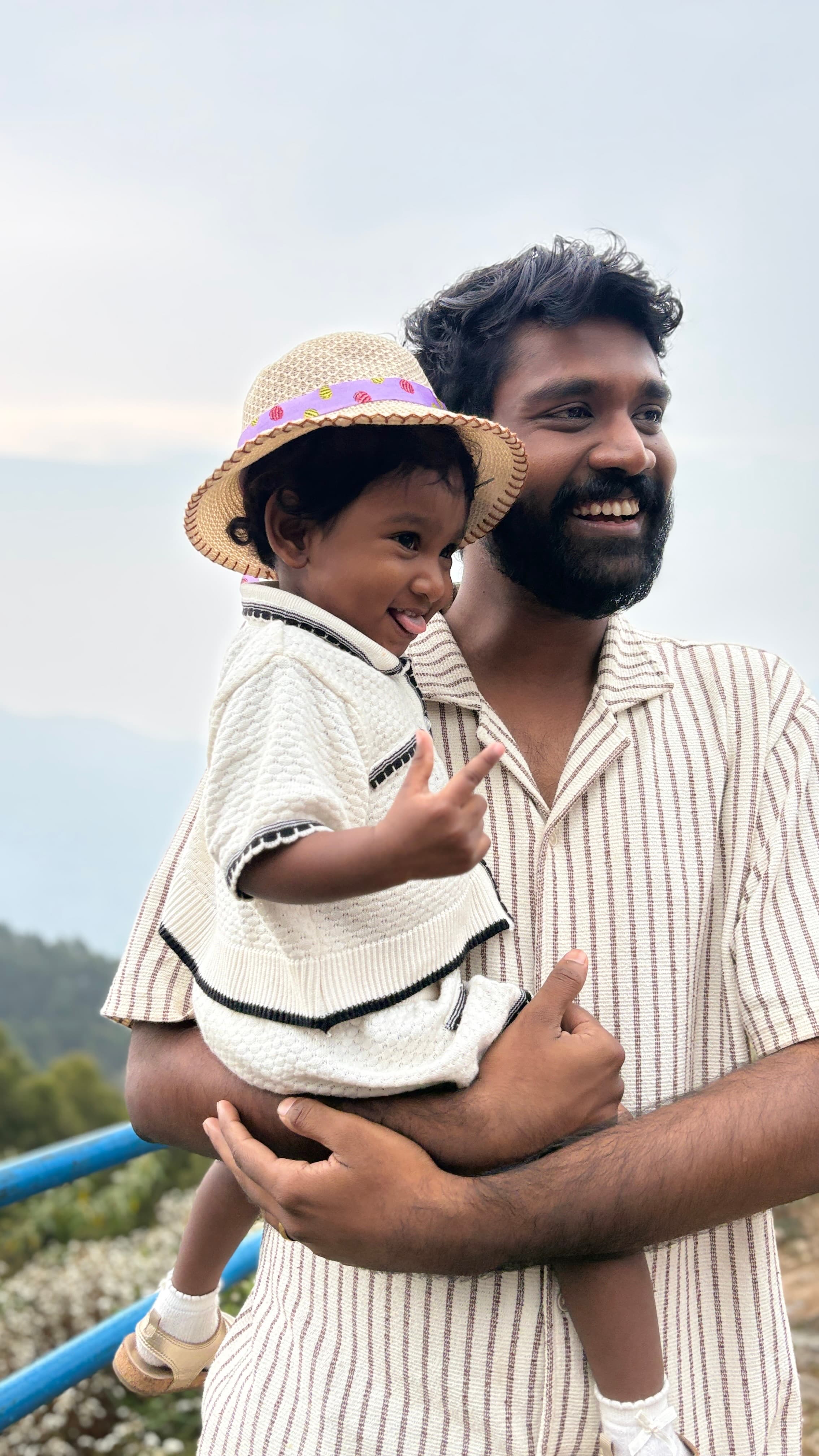 Daniel holding his niece Lael, in the hills